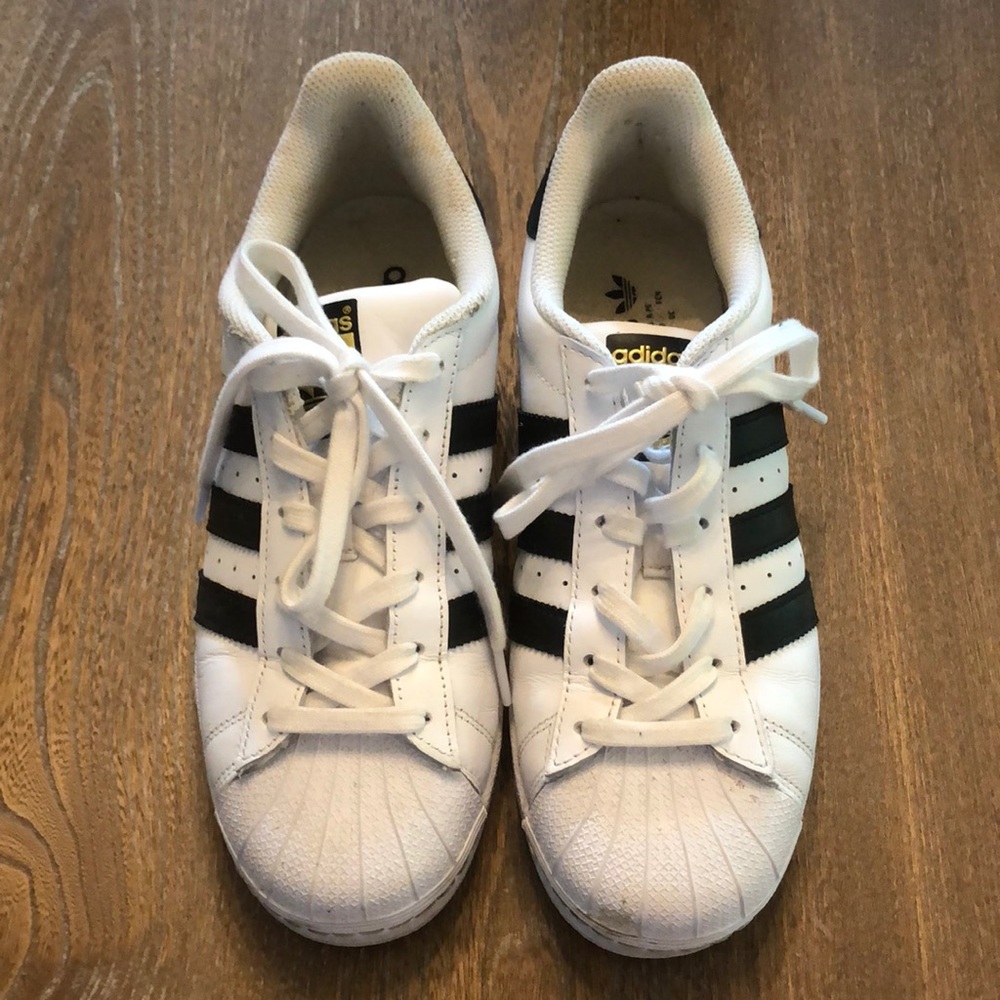Adidas Superstar Sneakers with black stripes